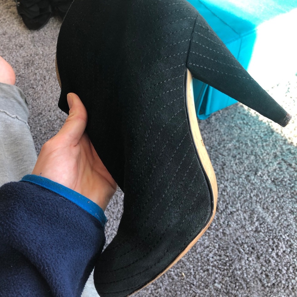 Suede leather black high heel boots.